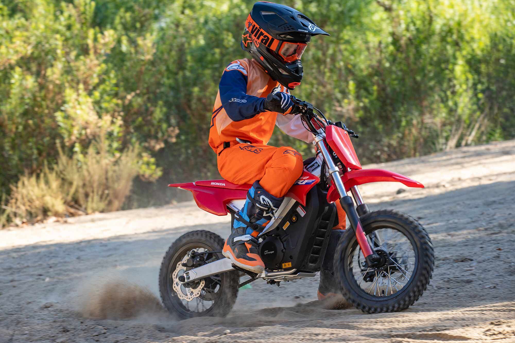 The CRF-E2’s 12-inch rims help slot it in between the gas-powered CRF50F (10-inch wheels) and the CRF110F (14-inch front and 12-inch rear).
