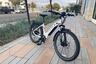 aventon level 2 parked on city sidewalk